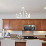 8-Light Farmhouse Modern Rustic White Wagon Wheel Chandelier - Image 2